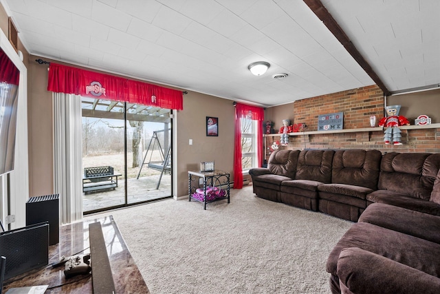 carpeted living area with visible vents