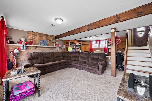 living room featuring stairs, carpet floors, and visible vents