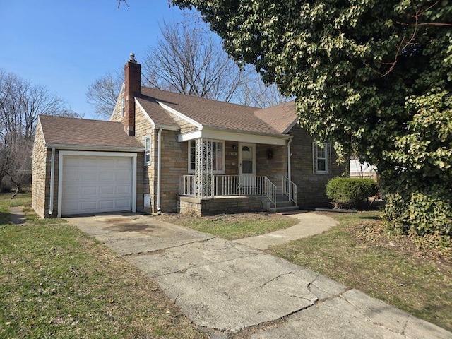 view of front of house featuring concrete driveway, covered porch, a chimney, stone siding, and an attached garage