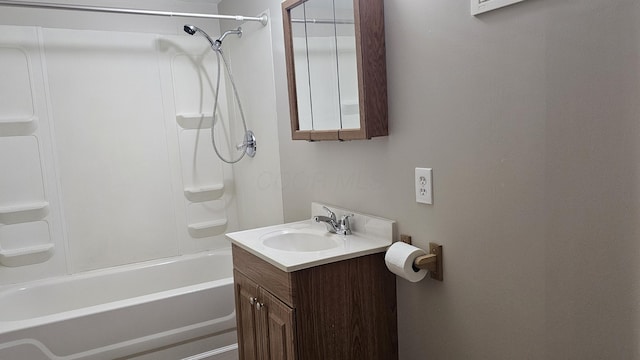 bathroom featuring vanity and bathtub / shower combination