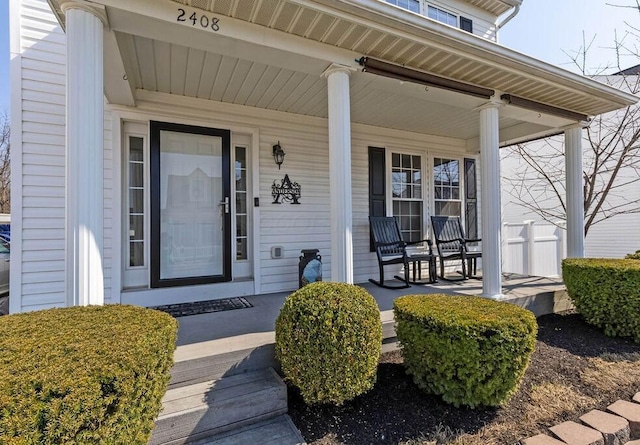 doorway to property with covered porch