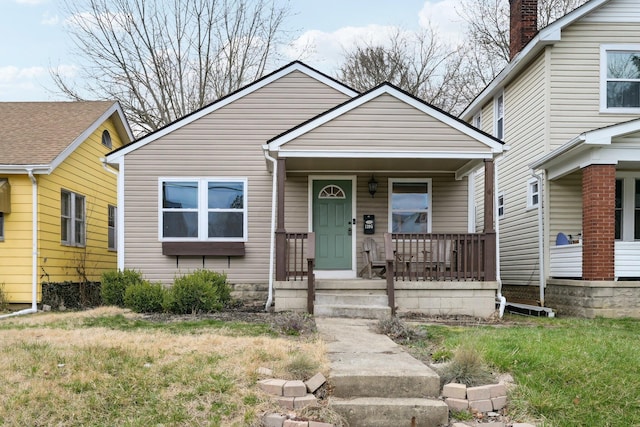 bungalow-style home with a porch
