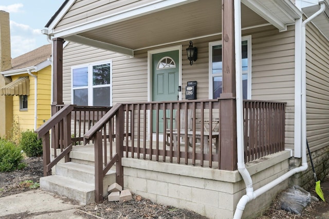 doorway to property with a porch