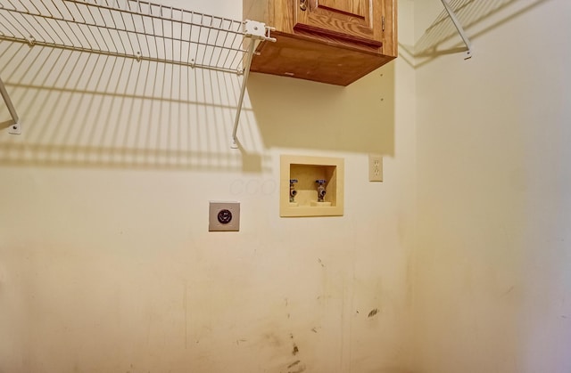 laundry area featuring washer hookup, cabinet space, and hookup for an electric dryer