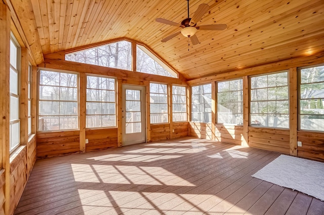 unfurnished sunroom with vaulted ceiling, wooden ceiling, and ceiling fan