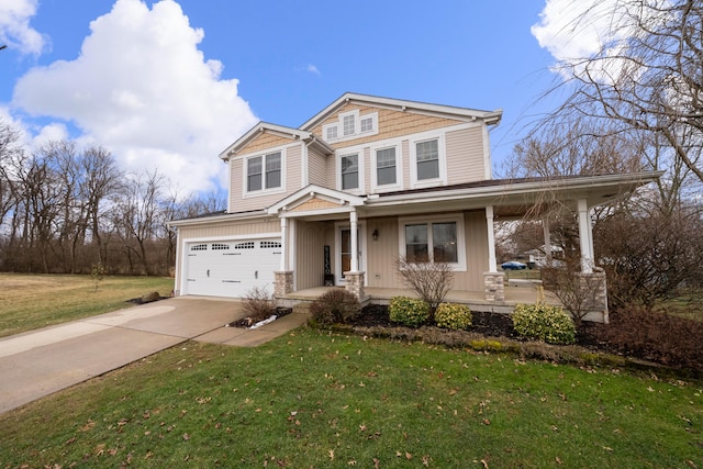 view of front of home featuring an attached garage, driveway, a porch, and a front yard