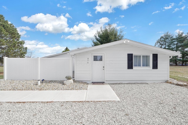 view of front of home with fence