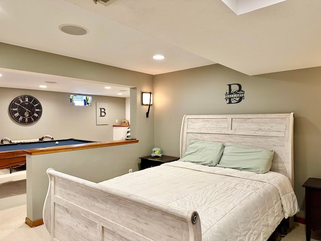 carpeted bedroom with recessed lighting