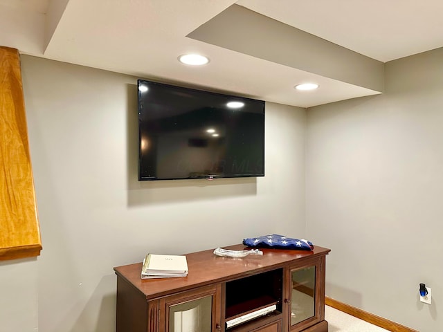 interior details featuring baseboards and recessed lighting