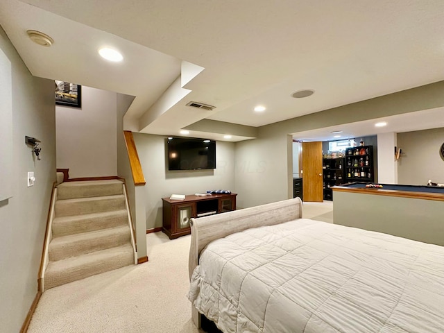 bedroom featuring light carpet, recessed lighting, visible vents, and baseboards