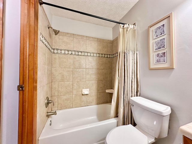 bathroom with shower / bath combo, a textured ceiling, and toilet