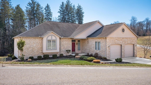 single story home with stucco siding, an attached garage, a shingled roof, and driveway