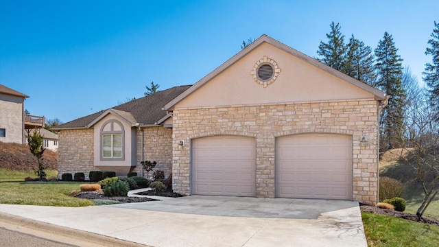 view of front of property with roof with shingles, a garage, driveway, and stucco siding