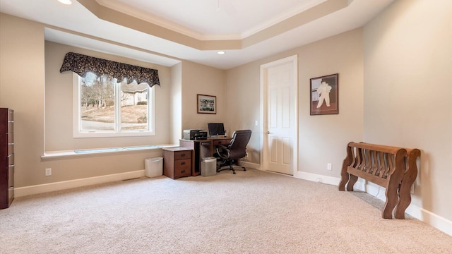 office space featuring recessed lighting, baseboards, a raised ceiling, and carpet floors