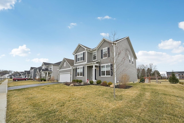 traditional home with a playground, aphalt driveway, board and batten siding, and a front yard