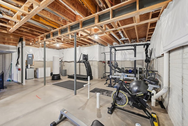 exercise room with washing machine and clothes dryer