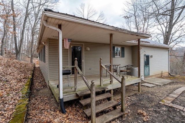 exterior space featuring a wooden deck