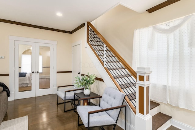 staircase with recessed lighting, french doors, crown molding, and wood finished floors