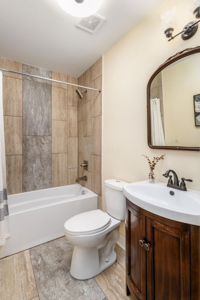 full bath featuring shower / bath combination with curtain, visible vents, vanity, and toilet