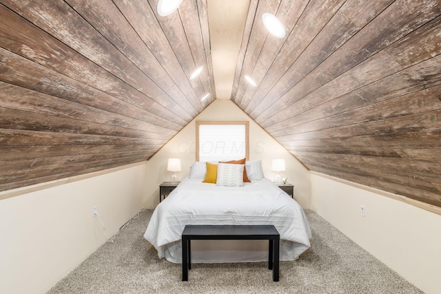 carpeted bedroom featuring wooden ceiling and vaulted ceiling