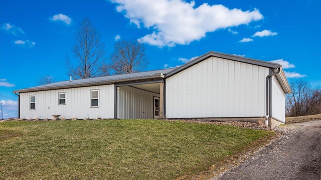 view of home's exterior with a lawn