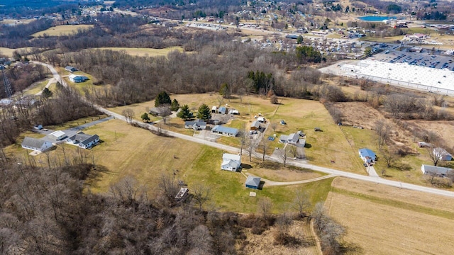 birds eye view of property featuring a rural view