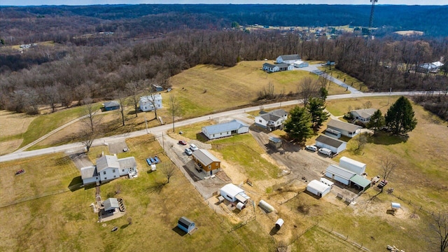 drone / aerial view with a view of trees