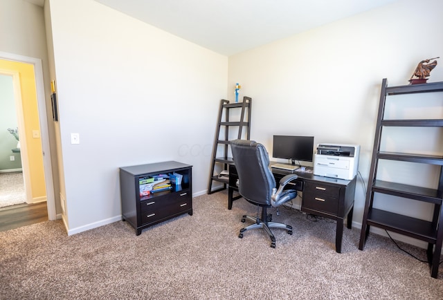 carpeted office with baseboards