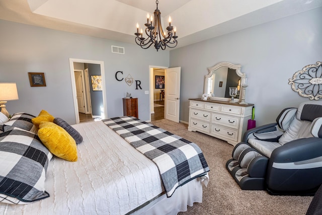 carpeted bedroom featuring a chandelier, visible vents, and a raised ceiling