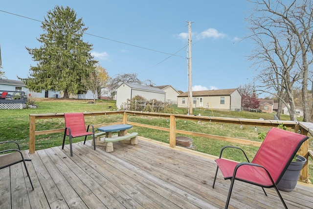 deck featuring a lawn