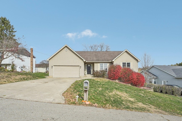 single story home with an attached garage, driveway, and a front yard