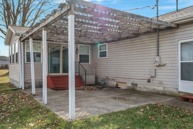 view of patio featuring entry steps and a pergola