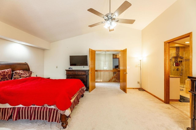carpeted bedroom with baseboards, vaulted ceiling, ceiling fan, and ensuite bath