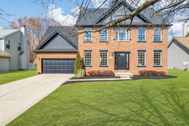 colonial house featuring a garage, brick siding, concrete driveway, and a front yard