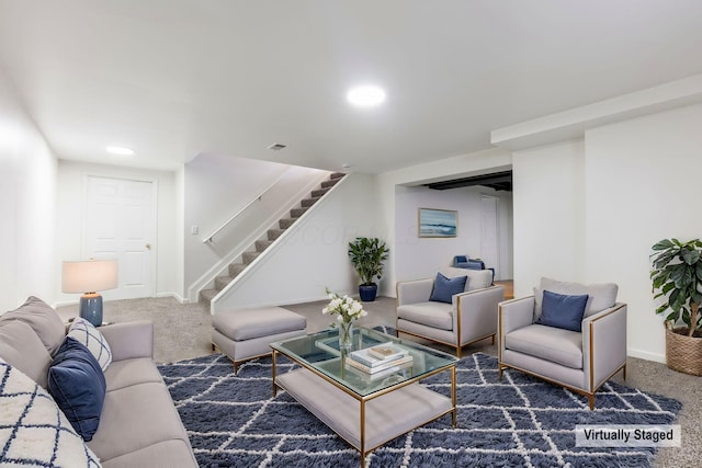 living room with recessed lighting, carpet, and stairs