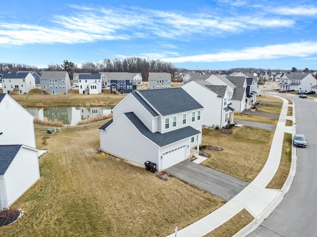 birds eye view of property with a residential view