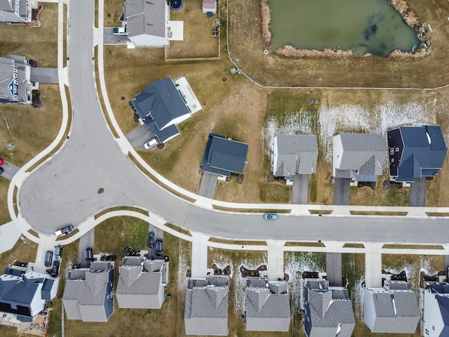 birds eye view of property with a residential view