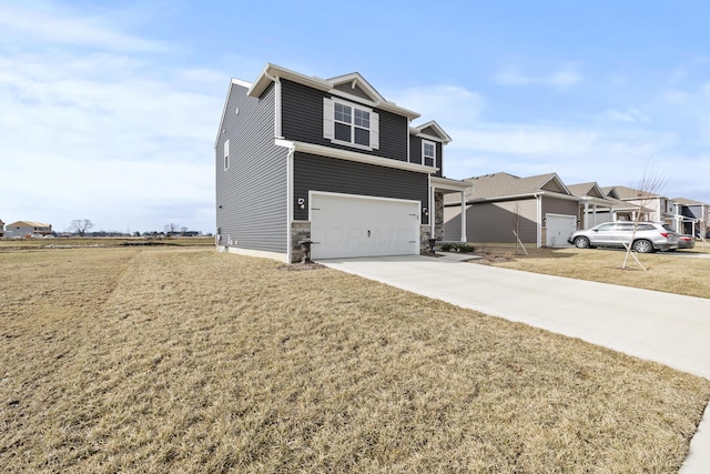 view of front of house with an attached garage, concrete driveway, a front lawn, stone siding, and a residential view