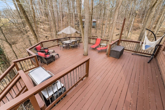 deck featuring outdoor dining space