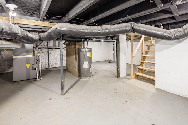 unfinished basement featuring stairs, heating unit, and water heater