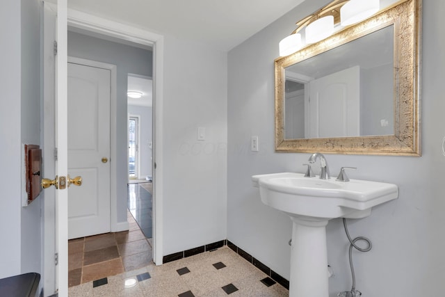 bathroom with baseboards