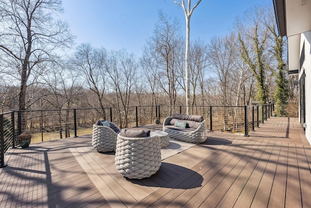 wooden deck with an outdoor hangout area