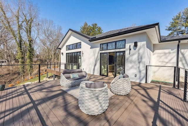 deck with an outdoor living space