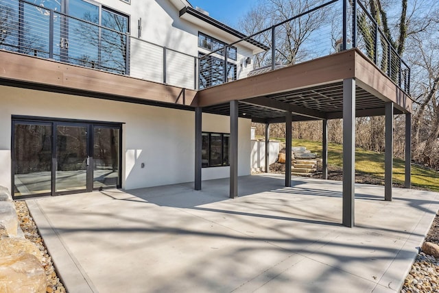 view of patio with a balcony