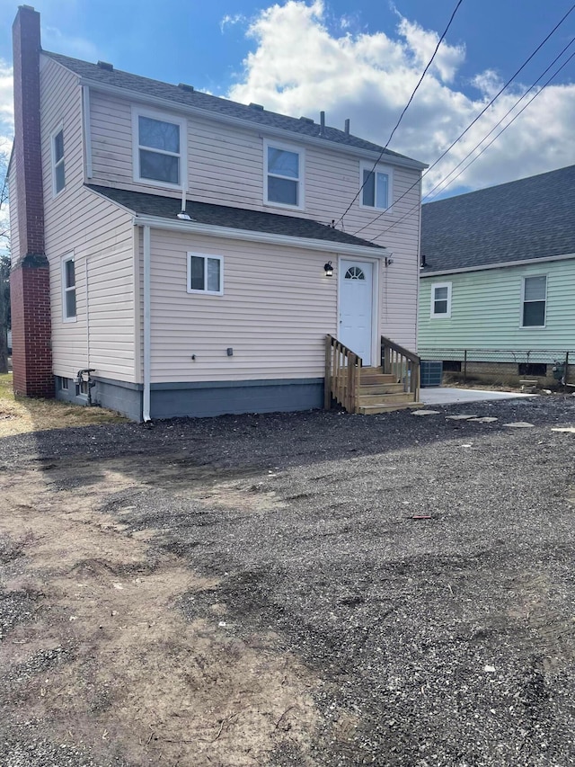 back of property with entry steps