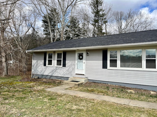 view of front of property with a front lawn and entry steps