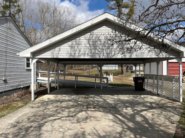 exterior space with a carport and driveway