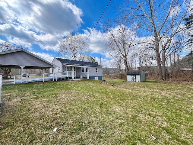 view of yard featuring an outbuilding and a storage unit