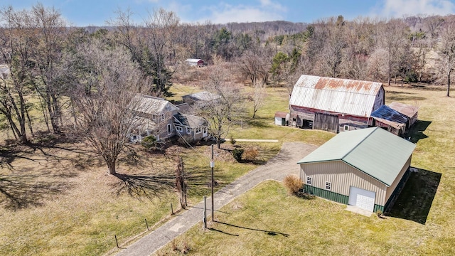 bird's eye view featuring a forest view