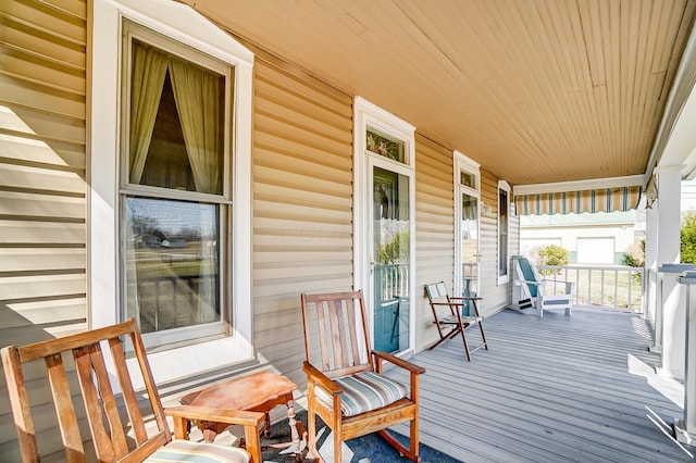 wooden terrace with covered porch